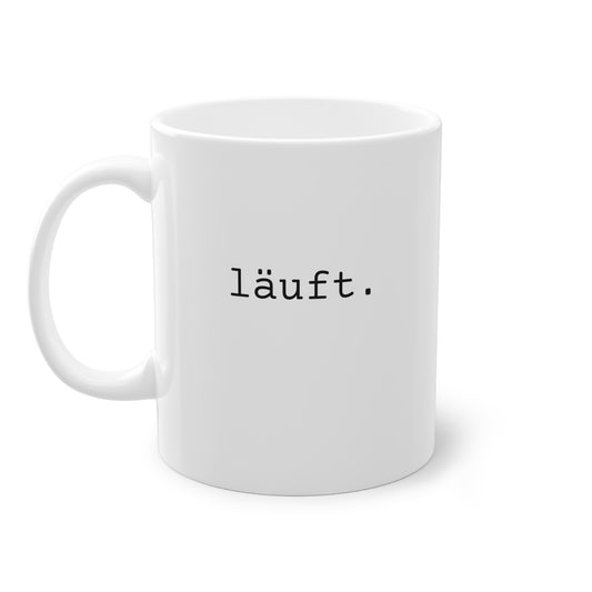 Weisse Design Tasse "läuft."